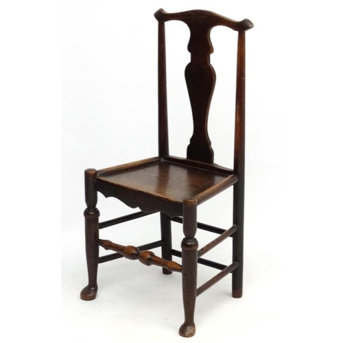 224 - An 18thC oak chair with solid seat and vase shaped splat 37 1/2'' high  Please Note -  we do not mak... 