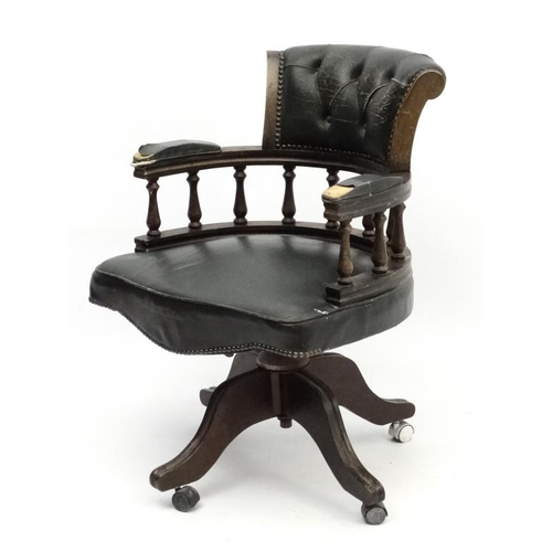 227 - A late 20thC stained walnut and green leather tilt and swivel office chair approx 34'' high  Please ... 