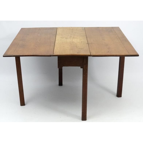 235 - An 18thC oak gateleg table ( 4 legs) 44'' long x 47'' extended  Please Note -  we do not make refere... 