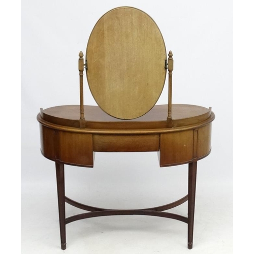 242 - An early - mid 20thC mahogany kidney shaped dressing table and mirror 39 1/2'' wide x 53 1/2'' high ... 