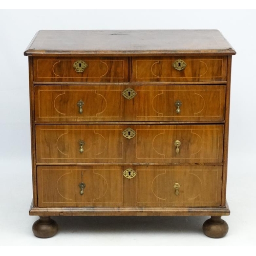 245 - An 18thC Dutch walnut inlaid chest of drawers comprising two short over 3 graduated long drawers wit... 