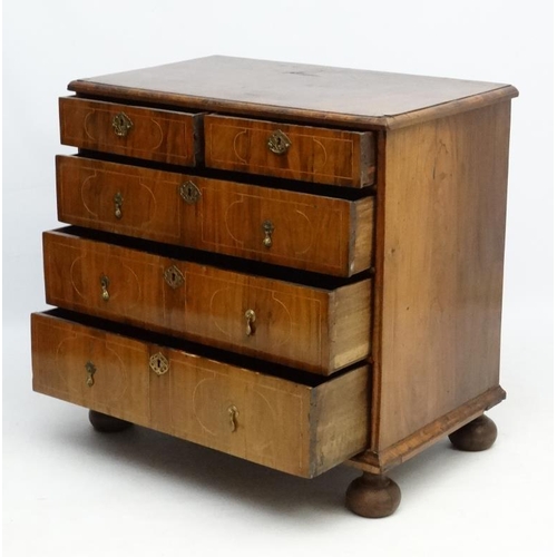 245 - An 18thC Dutch walnut inlaid chest of drawers comprising two short over 3 graduated long drawers wit... 