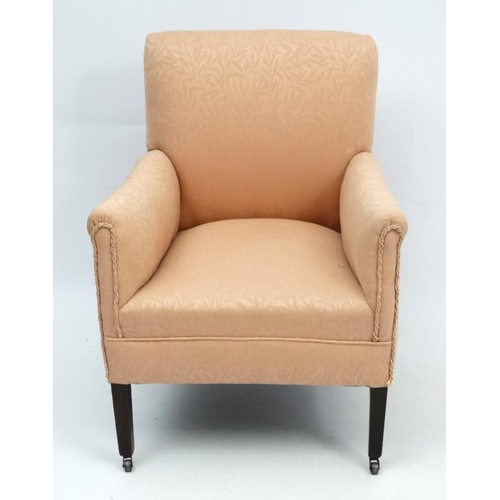 259 - An Edwardian upholstered armchair with squared tapering legs 32'' high  Please Note -  we do not mak... 