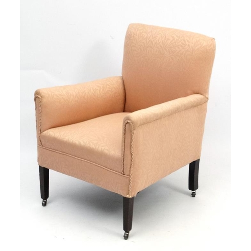 259 - An Edwardian upholstered armchair with squared tapering legs 32'' high  Please Note -  we do not mak... 