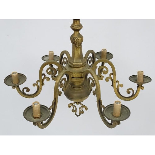 277 - An early 20thC brass squared 6-branch pendant electrolier. 23'' high x 25'' wide  Please Note -  we ... 