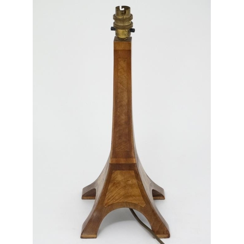 283 - An early - mid 20thC electric wooden table lamp in the form of the Eiffel tower. 5 1/2'' high  Pleas... 