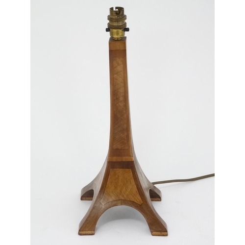 283 - An early - mid 20thC electric wooden table lamp in the form of the Eiffel tower. 5 1/2'' high  Pleas... 