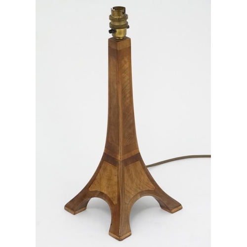 283 - An early - mid 20thC electric wooden table lamp in the form of the Eiffel tower. 5 1/2'' high  Pleas... 