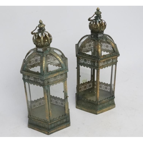 285 - A pair of hexagonal formed lanterns with glass panels approx ( late 20thC / 21stC ) 25'' high.  Plea... 