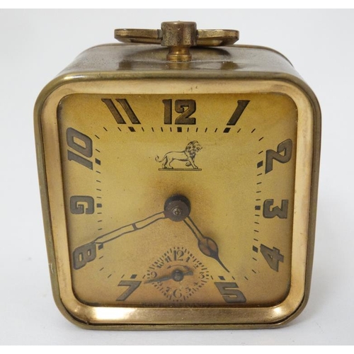 309 - Duverdrey & Bloque Cased alarm clock : an Art Deco square leather cased (and silk lined ) with Arabi... 