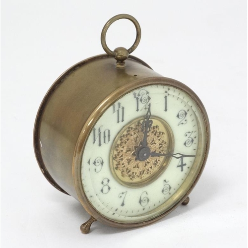 311 - C.1900 brass Bedside Clock : a bevelled glass fronted 3 3/4'' drum movement Timepiece with platform ... 