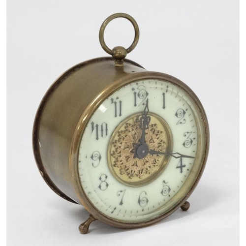 311 - C.1900 brass Bedside Clock : a bevelled glass fronted 3 3/4'' drum movement Timepiece with platform ... 