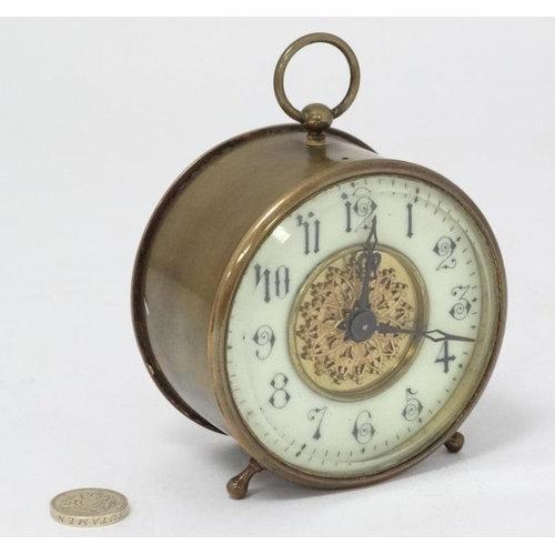 311 - C.1900 brass Bedside Clock : a bevelled glass fronted 3 3/4'' drum movement Timepiece with platform ... 