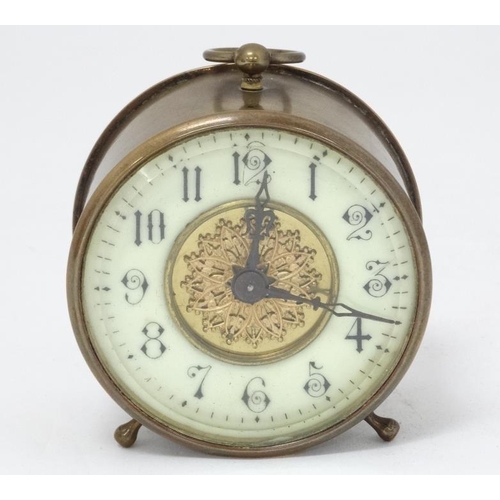 311 - C.1900 brass Bedside Clock : a bevelled glass fronted 3 3/4'' drum movement Timepiece with platform ... 