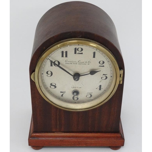 320 - ' Camerer Cuss & Co , London ' arch shaped mantle clock : a stained mahogany arch shaped case having... 