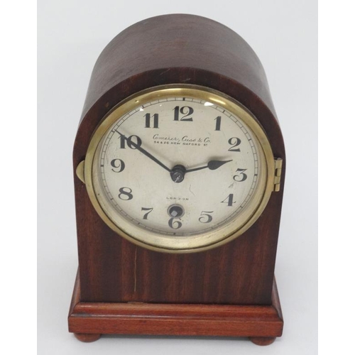 320 - ' Camerer Cuss & Co , London ' arch shaped mantle clock : a stained mahogany arch shaped case having... 