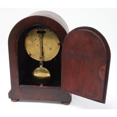 320 - ' Camerer Cuss & Co , London ' arch shaped mantle clock : a stained mahogany arch shaped case having... 