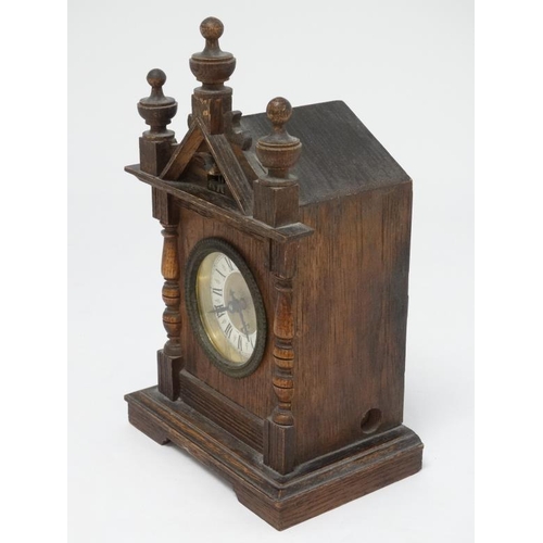 321 - Oak cased Cuckoo mantle Clock : a German made 2 3/4'' dial mantle clock  with two bellows and moving... 