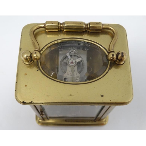 322 - 5 Glass Carriage Clock : a brass cased 5 bevelled glass French carriage clock ( timepiece )  , havin... 