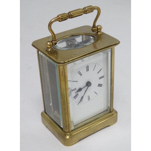 322 - 5 Glass Carriage Clock : a brass cased 5 bevelled glass French carriage clock ( timepiece )  , havin... 