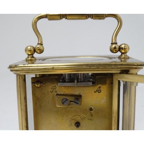 322 - 5 Glass Carriage Clock : a brass cased 5 bevelled glass French carriage clock ( timepiece )  , havin... 