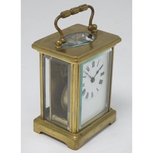 324 - 5 Glass Carriage Clock : a brass cased 5 bevelled glass  carriage clock ( timepiece )  , having key ... 