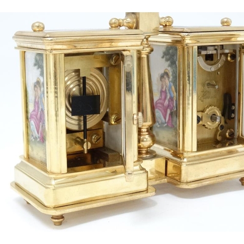 327 - A miniature Carriage Desk Compendium Set : a 21 st C brass cased miniature carriage clock and matchi... 