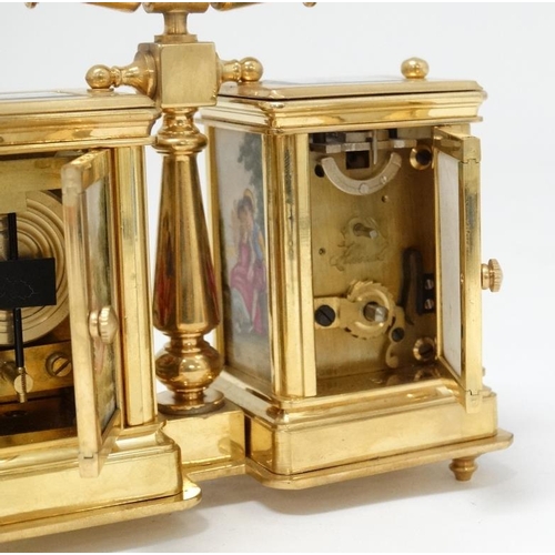 327 - A miniature Carriage Desk Compendium Set : a 21 st C brass cased miniature carriage clock and matchi... 