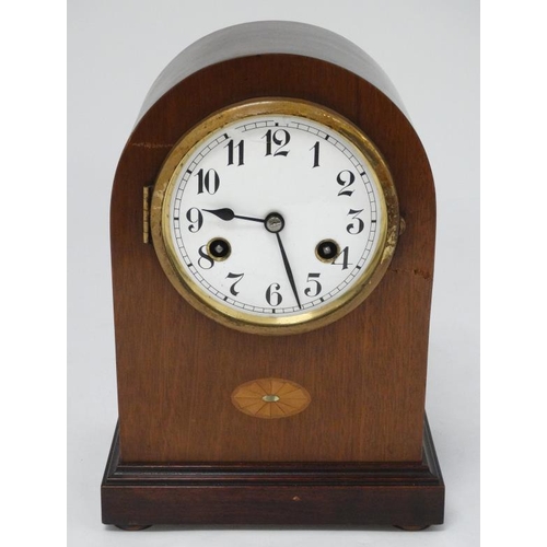 330 - Junghans Arch cased mantle clock : an 8 day plated  pendulum clock , striking on a coiled gong, with... 