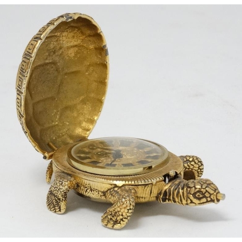 331 - Lance Tortoise alarm clock : an unusual novelty bedside alarm clock with gilded finish, ringing on a... 