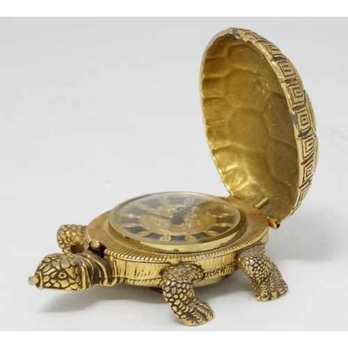 331 - Lance Tortoise alarm clock : an unusual novelty bedside alarm clock with gilded finish, ringing on a... 