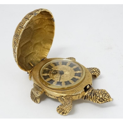 331 - Lance Tortoise alarm clock : an unusual novelty bedside alarm clock with gilded finish, ringing on a... 