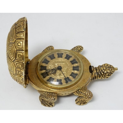 331 - Lance Tortoise alarm clock : an unusual novelty bedside alarm clock with gilded finish, ringing on a... 