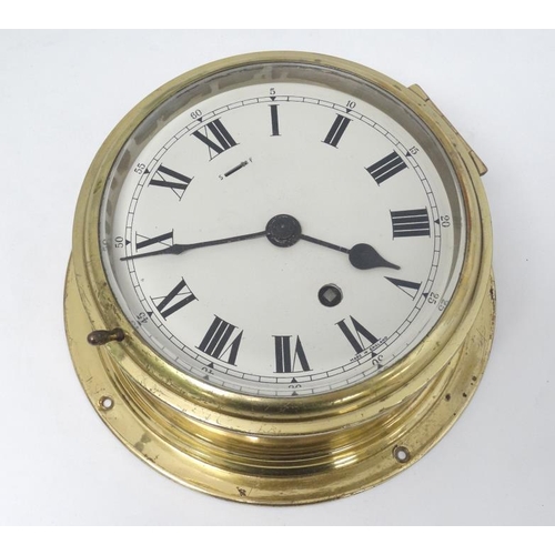 333 - Elliot Ship's Clock : a brass cased 6'' Bulkhead Timepiece , with signed ' Elliot London ' single tr... 