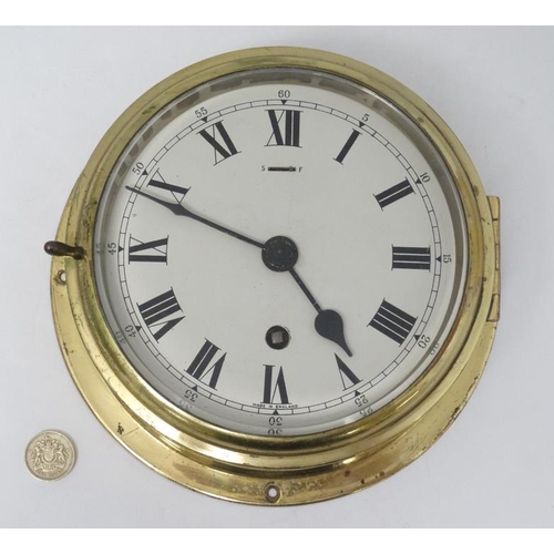 333 - Elliot Ship's Clock : a brass cased 6'' Bulkhead Timepiece , with signed ' Elliot London ' single tr... 