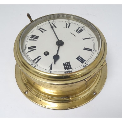 333 - Elliot Ship's Clock : a brass cased 6'' Bulkhead Timepiece , with signed ' Elliot London ' single tr... 