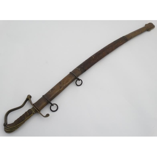 335 - Militaria : An unusual 19thC Eastern Sword , the brass hilt formed in Georgian pattern with bent gua... 