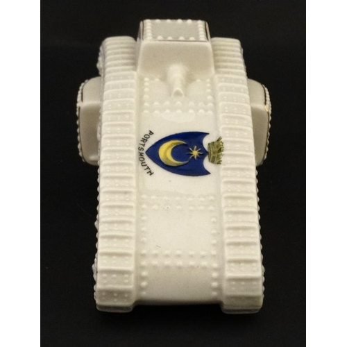 341 - Crestedware: An Arcadian China model of a World War 1 mark IV tank , registered design number 658588... 