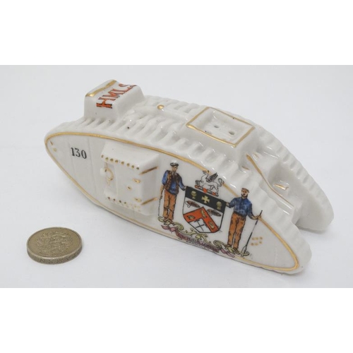 343 - Crestedware: A Carlton China model of a World War 1 mark IV tank , bears 'Barnsley' crest to front m... 