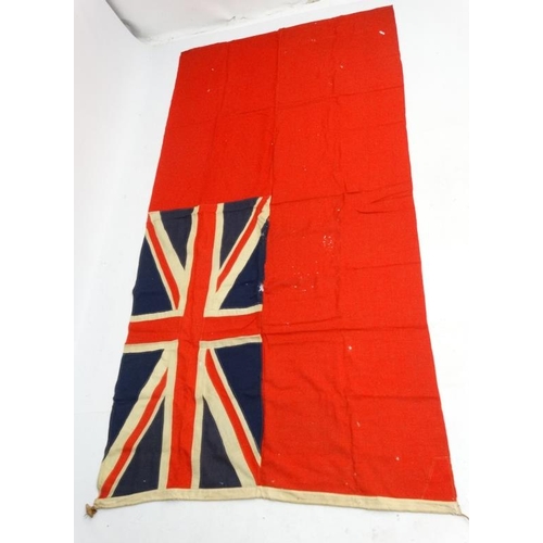 367 - Militaria : A large mid-20thC British Merchant Naval Red Ensign flag , probably from a WWII vessel ,... 