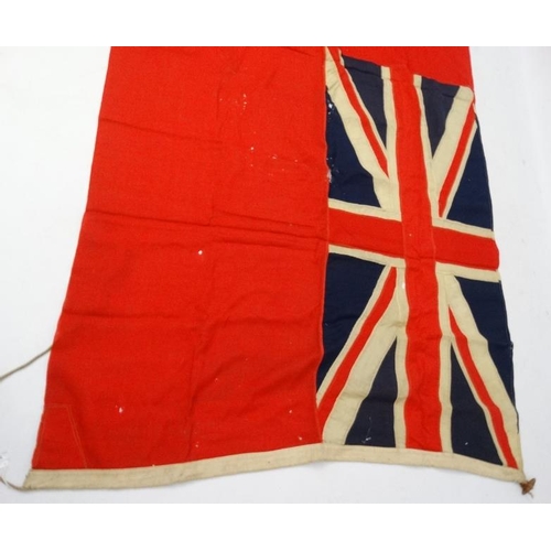 367 - Militaria : A large mid-20thC British Merchant Naval Red Ensign flag , probably from a WWII vessel ,... 