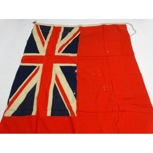 367 - Militaria : A large mid-20thC British Merchant Naval Red Ensign flag , probably from a WWII vessel ,... 