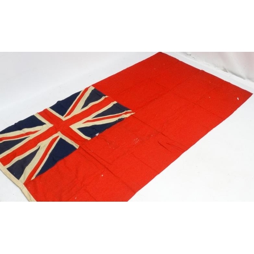 367 - Militaria : A large mid-20thC British Merchant Naval Red Ensign flag , probably from a WWII vessel ,... 