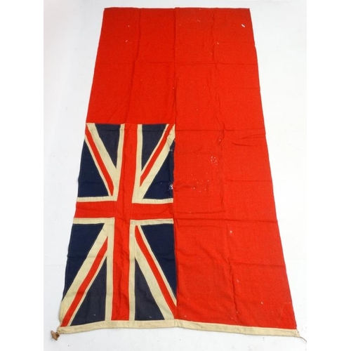 367 - Militaria : A large mid-20thC British Merchant Naval Red Ensign flag , probably from a WWII vessel ,... 