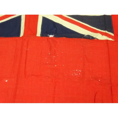 367 - Militaria : A large mid-20thC British Merchant Naval Red Ensign flag , probably from a WWII vessel ,... 