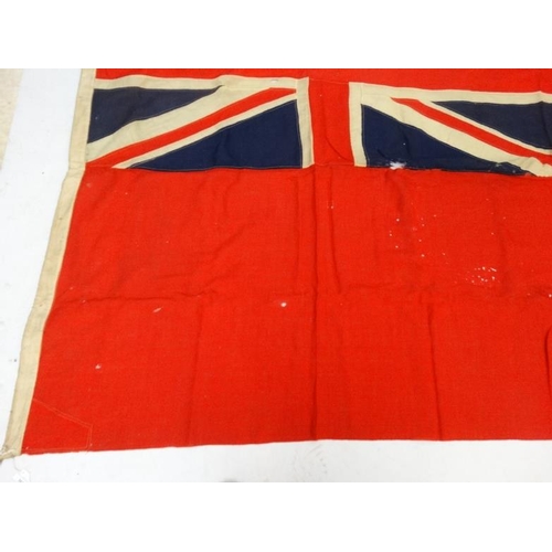 367 - Militaria : A large mid-20thC British Merchant Naval Red Ensign flag , probably from a WWII vessel ,... 