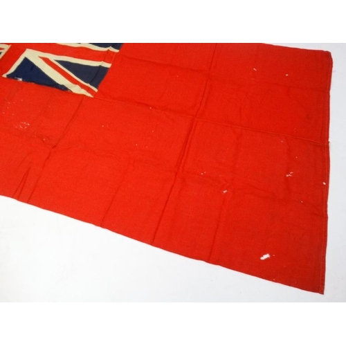 367 - Militaria : A large mid-20thC British Merchant Naval Red Ensign flag , probably from a WWII vessel ,... 