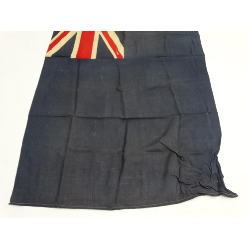 368 - Militaria : A large mid-20thC British Royal Navy Blue Ensign flag , probably from a WWII vessel , ap... 