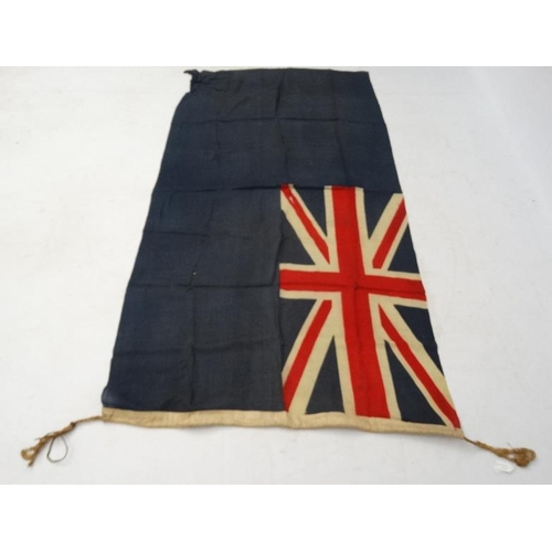 368 - Militaria : A large mid-20thC British Royal Navy Blue Ensign flag , probably from a WWII vessel , ap... 