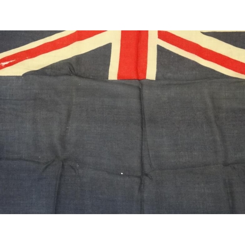 368 - Militaria : A large mid-20thC British Royal Navy Blue Ensign flag , probably from a WWII vessel , ap... 